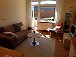 Wohnzimmer mit Couch und Fernseher - Ferienwohnung App. 27 (Jensen & Schmeck) - Top-Hundeurlaub