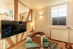 R01_Gruppenhaus Rosenhof_Wohnzimmer_01 - Gruppenhaus Rosenhof - Top-Hundeurlaub