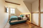 R01_Gruppenhaus Rosenhof_Schlafzimmer_01 - Gruppenhaus Rosenhof - Top-Hundeurlaub
