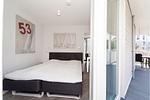 zweites Schlafzimmer mit Terasse - Dünenvilla 10 Wohnung 02 - Top-Hundeurlaub