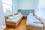 Schlafzimmer 2, 2 Einzelbetten - Happy Aich 1 by Alpenidyll Apartments - Top-Hundeurlaub