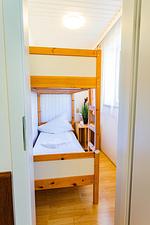 Schlafzimmer 2, Etagenbett - Soldanella 8 by Alpenidyll Apartments - Top-Hundeurlaub