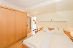 Schlafzimmer 1, Doppelbett - City Life 4 by Alpenidyll Apartments - Top-Hundeurlaub