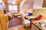 Wohnzimmer - City Life 6 by Alpenidyll Apartments - Top-Hundeurlaub