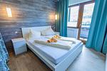 Schlafzimmer 1, Doppelbett - Huberhof 10 by Alpenidyll Apartments - Top-Hundeurlaub