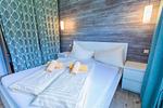 Schlafzimmer 1, Doppelbett - Huberhof 10 by Alpenidyll Apartments - Top-Hundeurlaub
