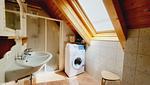 Badezimmer mit Dusche und Waschmaschine - Stodertraum 3 "Löwenzahn" by Alpenidyll Apartments - Top-Hundeurlaub