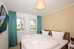Schlafzimmer - FeWo10-1: strandnah,Terrasse,Sauna,Pool - Top-Hundeurlaub