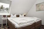 Schlafzimmer - FeWo11-6: strandnah,Balkon,Sauna,Pool - Top-Hundeurlaub