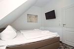 Schlafzimmer - FeWo11-6: strandnah,Balkon,Sauna,Pool - Top-Hundeurlaub