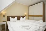 Schlafzimmer - FeWo11-6: strandnah,Balkon,Sauna,Pool - Top-Hundeurlaub
