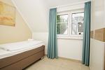 Schlafzimmer - FeWo11-6: strandnah,Balkon,Sauna,Pool - Top-Hundeurlaub