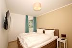 Schlafzimmer - FeWo10-3: strandnah,Terrasse,Sauna,Pool - Top-Hundeurlaub