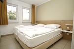 Schlafzimmer - FeWo30-2: strandnah,Terrasse,Sauna,Pool - Top-Hundeurlaub