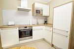 Küche / Küchenzeile - FeWo30-8: strandnah,Balkon,Sauna,Pool - Top-Hundeurlaub
