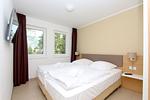 Schlafzimmer - FeWo14-2: strandnah,Terrasse,Sauna,Pool - Top-Hundeurlaub