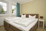 Schlafzimmer - FeWo13-4: strandnah,Terrasse,Sauna,Pool - Top-Hundeurlaub