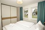 Schlafzimmer - FeWo13-4: strandnah,Terrasse,Sauna,Pool - Top-Hundeurlaub