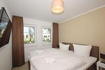 Schlafzimmer - FeWo14-1: strandnah,Terrasse,Sauna,Pool - Top-Hundeurlaub