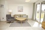 Wohnzimmer - FeWo12-2: strandnah,Terrasse,Sauna,Pool - Top-Hundeurlaub