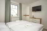 Schlafzimmer - FeWo12-2: strandnah,Terrasse,Sauna,Pool - Top-Hundeurlaub