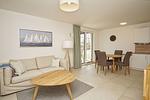 Wohnzimmer - FeWo12-4: strandnah,Terrasse,Sauna,Pool - Top-Hundeurlaub