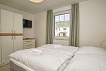 Schlafzimmer - FeWo12-4: strandnah,Terrasse,Sauna,Pool - Top-Hundeurlaub