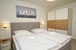Schlafzimmer - FeWo12-1: strandnah,Terrasse,Sauna,Pool - Top-Hundeurlaub