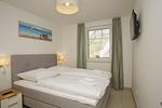 Schlafzimmer - FeWo12-1: strandnah,Terrasse,Sauna,Pool - Top-Hundeurlaub