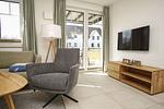 Wohnzimmer - FeWo12-3: strandnah,Terrasse,Sauna,Pool - Top-Hundeurlaub