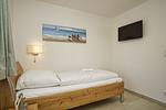 Schlafzimmer - FeWo12-3: strandnah,Terrasse,Sauna,Pool - Top-Hundeurlaub
