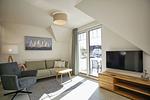 Wohnzimmer - FeWo12-6: strandnah,Balkon,Sauna,Pool - Top-Hundeurlaub