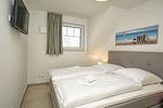 Schlafzimmer - FeWo12-6: strandnah,Balkon,Sauna,Pool - Top-Hundeurlaub