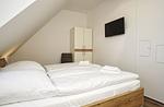 Schlafzimmer - FeWo12-6: strandnah,Balkon,Sauna,Pool - Top-Hundeurlaub
