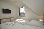 Schlafzimmer - FeWo12-7: strandnah,Balkon,Sauna,Pool - Top-Hundeurlaub