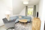 Wohnzimmer - FeWo15-5: strandnah,Balkon,Sauna,Pool - Top-Hundeurlaub