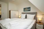 Schlafzimmer - FeWo15-5: strandnah,Balkon,Sauna,Pool - Top-Hundeurlaub