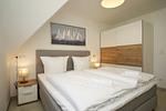 Schlafzimmer - FeWo15-5: strandnah,Balkon,Sauna,Pool - Top-Hundeurlaub