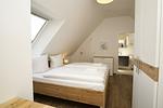 Schlafzimmer - FeWo15-5: strandnah,Balkon,Sauna,Pool - Top-Hundeurlaub