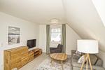 Wohnzimmer - FeWo15-8: strandnah,Balkon,Sauna,Pool - Top-Hundeurlaub
