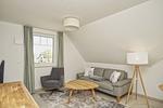 Wohnzimmer - FeWo15-8: strandnah,Balkon,Sauna,Pool - Top-Hundeurlaub