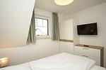 Schlafzimmer - FeWo15-6: strandnah,Balkon,Sauna,Pool - Top-Hundeurlaub