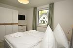 Schlafzimmer - FeWo15-4: strandnah,Terrasse,Sauna,Pool - Top-Hundeurlaub