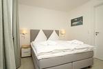 Schlafzimmer - FeWo15-4: strandnah,Terrasse,Sauna,Pool - Top-Hundeurlaub