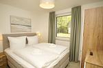 Schlafzimmer - FeWo15-2: strandnah,Terrasse,Sauna,Pool - Top-Hundeurlaub