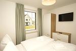 Schlafzimmer - FeWo15-2: strandnah,Terrasse,Sauna,Pool - Top-Hundeurlaub