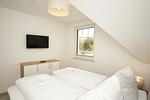 Schlafzimmer - FeWo15-7: strandnah,Balkon,Sauna,Pool - Top-Hundeurlaub