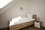 Schlafzimmer - FeWo15-7: strandnah,Balkon,Sauna,Pool - Top-Hundeurlaub