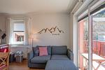 Wohnzimmer mit Zugang Balkon - Dachsteinblick by Alpendyll Apartments - Top-Hundeurlaub