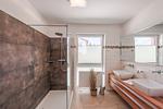 Badezimmer mit Dusche und WC - Dachsteinblick by Alpendyll Apartments - Top-Hundeurlaub